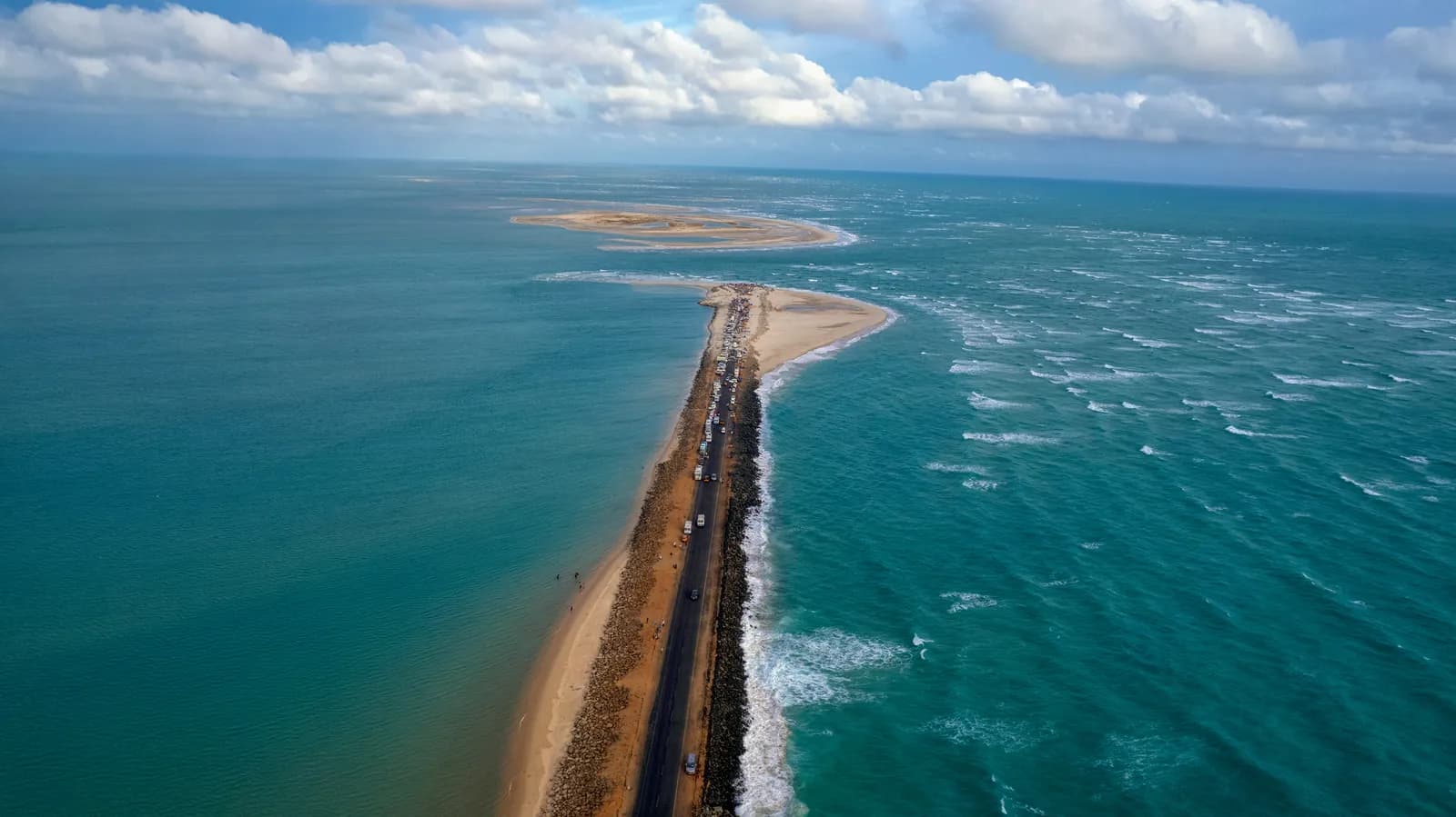 Aerial view of the Dhanushkodi sandbar reaching into the sea where the Rama Setu begins