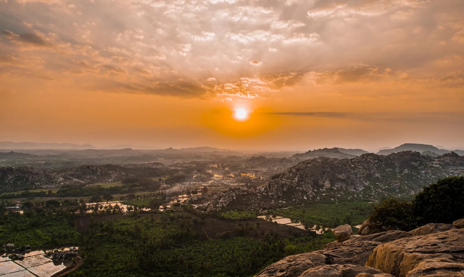 Sunset over the boulder landscape of Kishkindha at Hampi